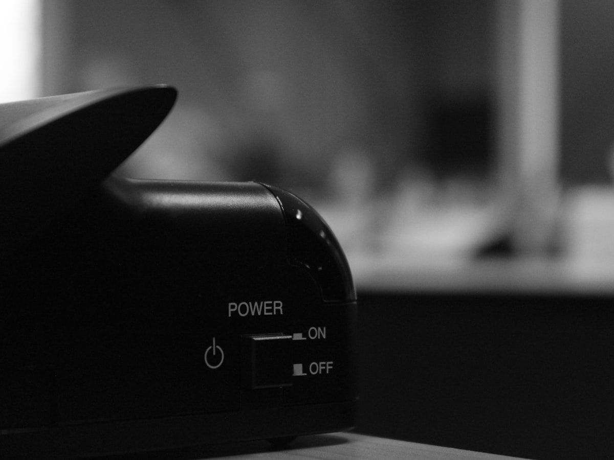 A close up of a black and white photo of an electronic device